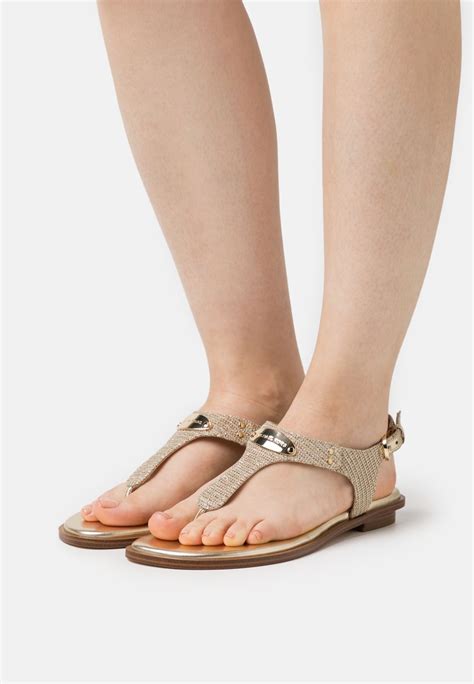 michael michael kors footwear mk plate thong sandal gold|michael kors low heel sandals.